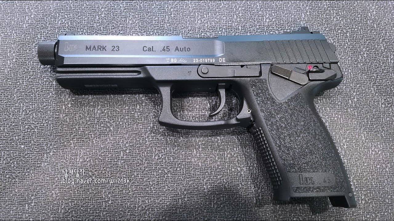 Look how much bigger the MARK23 is compared to the USP Tactical below... 